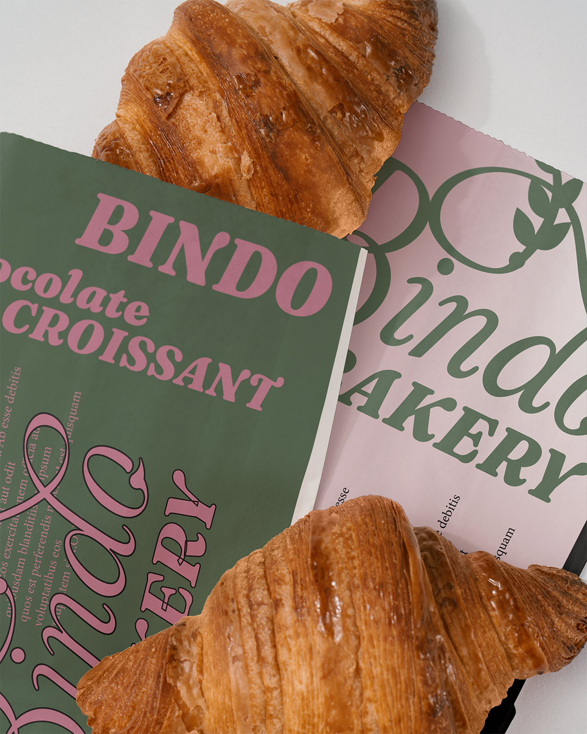 A photo of croissants in a Bindo Bakery's branded package.